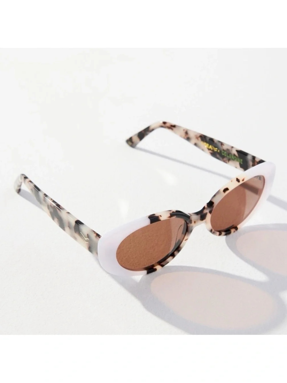 Anthropologie Tortoiseshell and White Oval Sunglasses - Brown Lenses